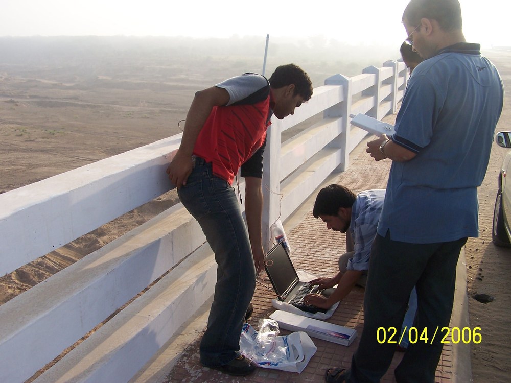 The base station on the bridge over the Sabarmati, April 2006 - a laptop, an antenna and a good deal of patience
